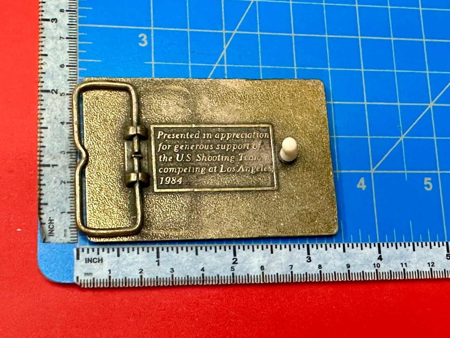 Aiming for Olympic gold - Los Angeles 1984 US shooting Team belt buckle