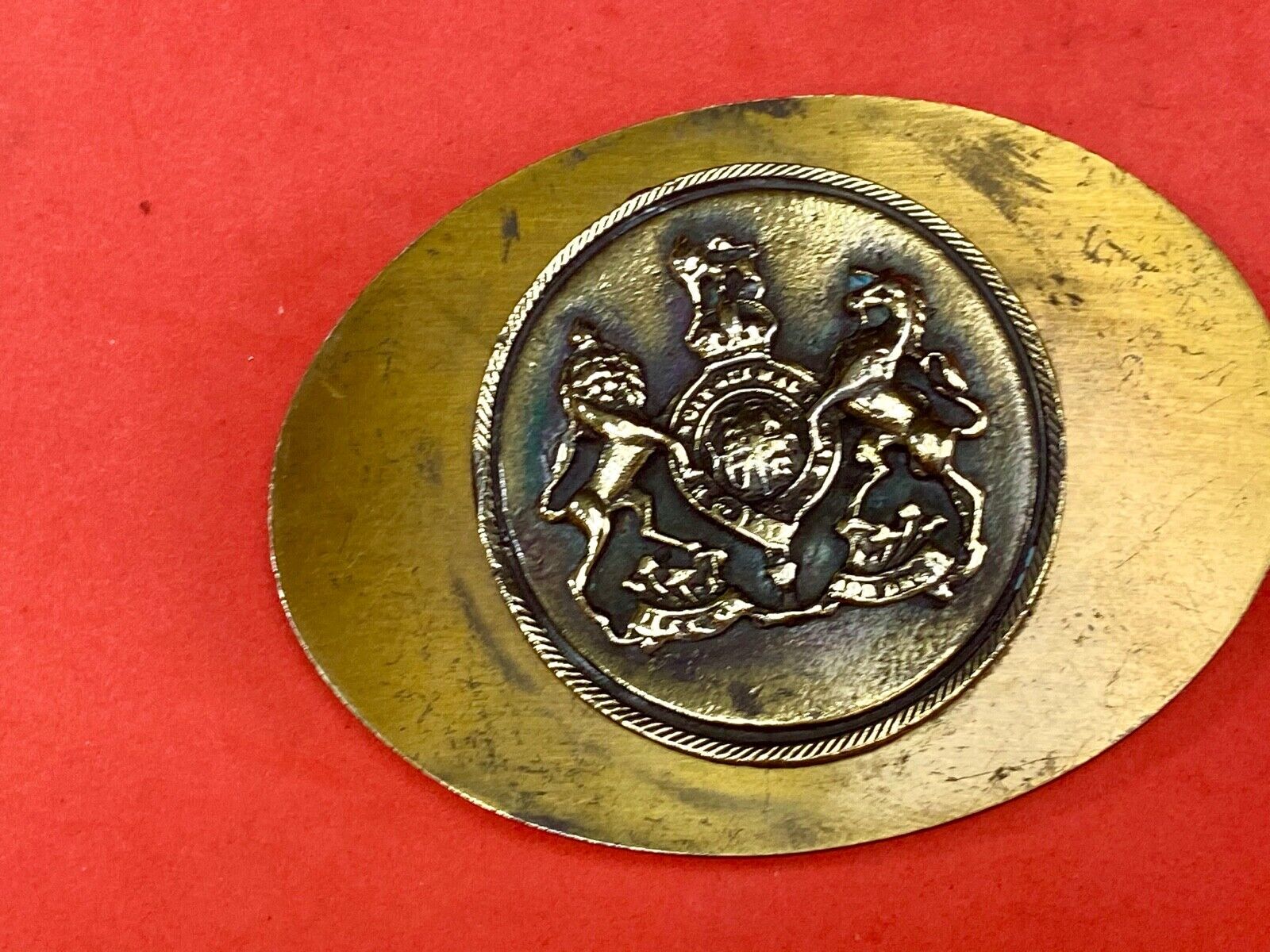 Unknown to me - family crest? Wild horses belt buckle 
