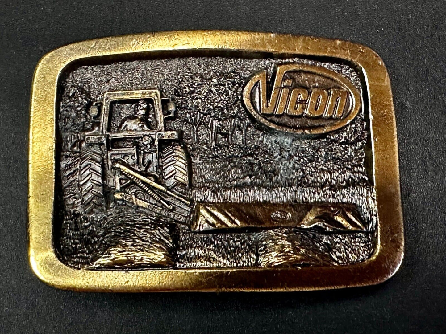 Vicon Disk Mower Tractor Promotional Belt Buckle by Premium Specialties