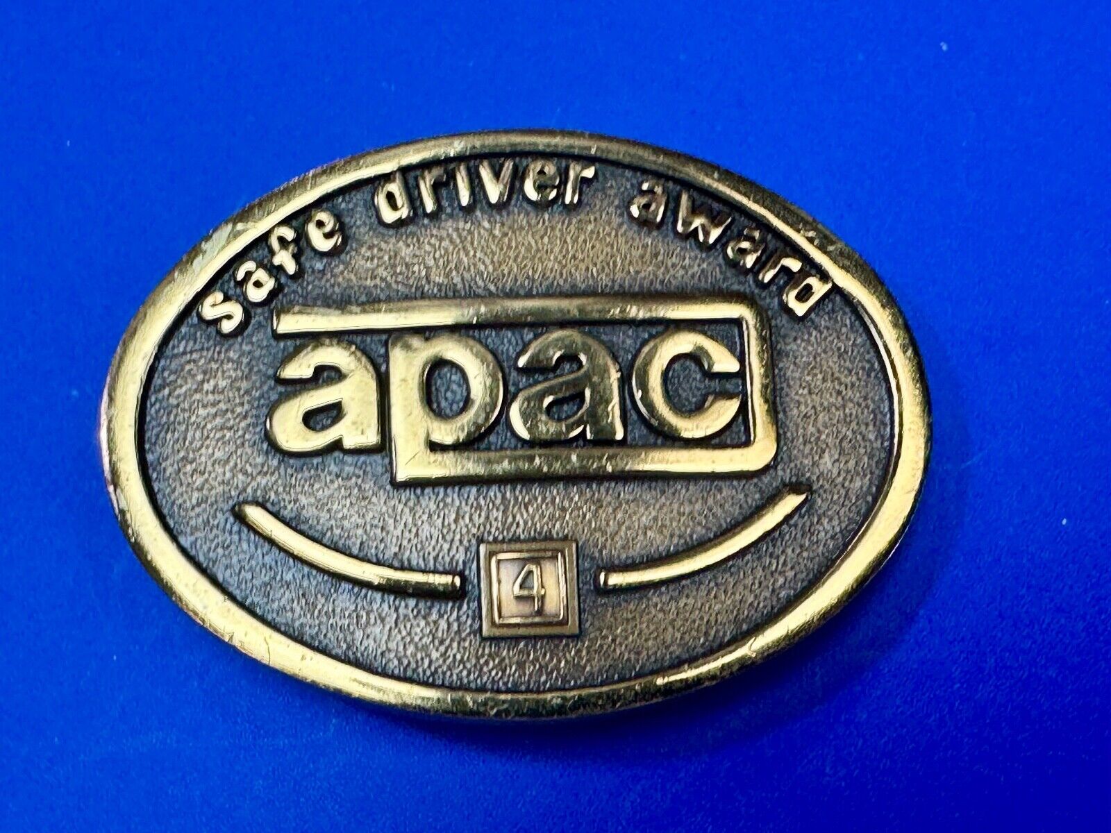 APAC Safe Driver Award belt buckle with 4 year pin by Jostens