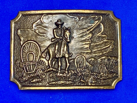 Tall in the Saddle - Covered Wagon Cowboy brass tone western belt buckle