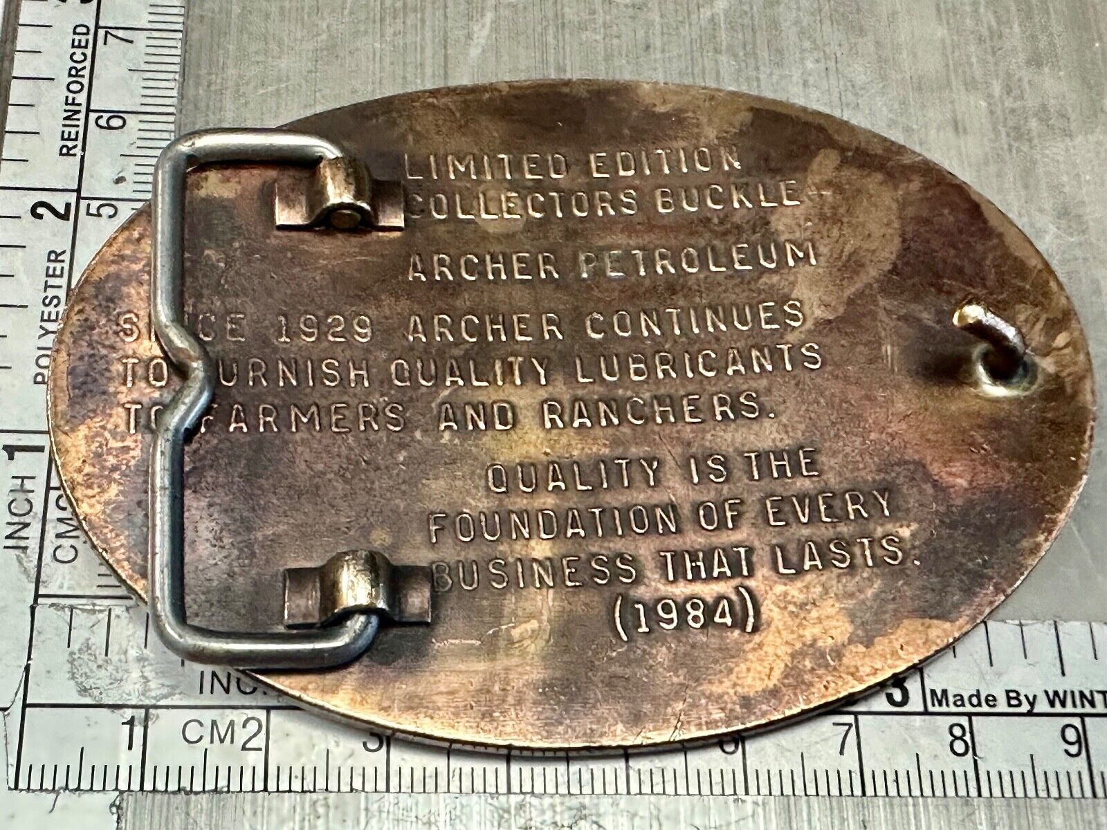 Archer Lubricants Omaha NE - Oil for farmers ranchers belt buckle