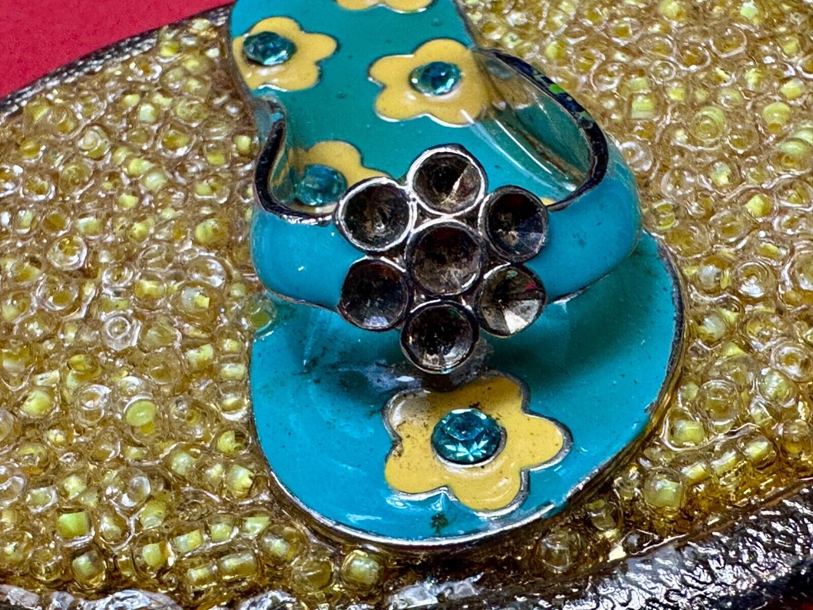unique flip flop on sand - beach girls artisan belt buckle - missing stones?