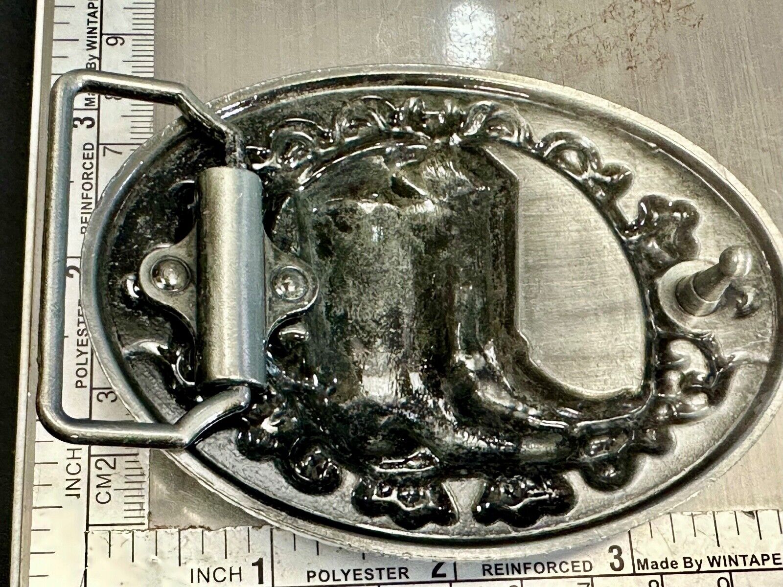 Western Cowboy Boots Belt Buckle with ornate flower swirl and rope boarder