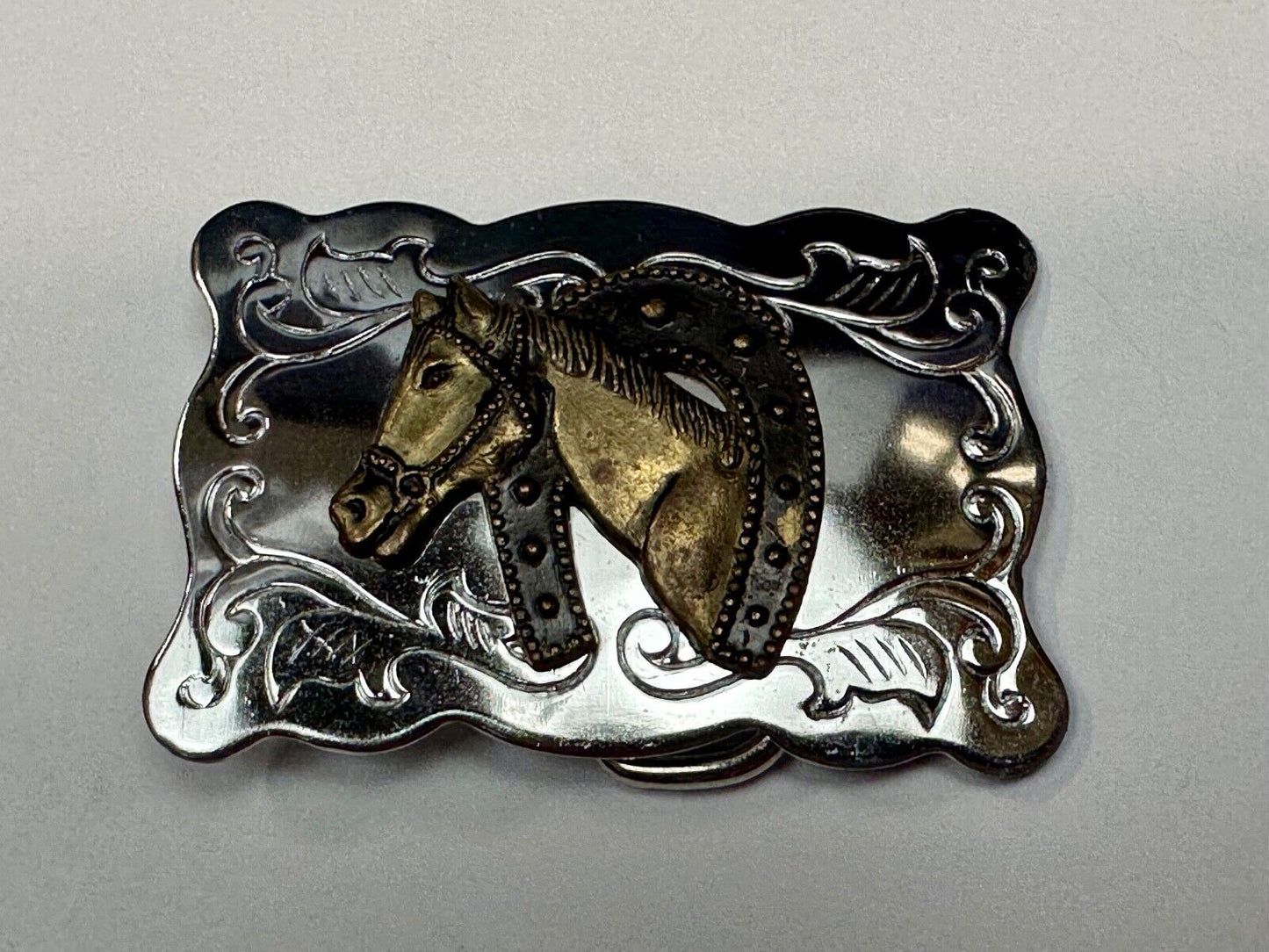 Vintage lucky horseshoe with head centerpiece on western two tone belt buckle