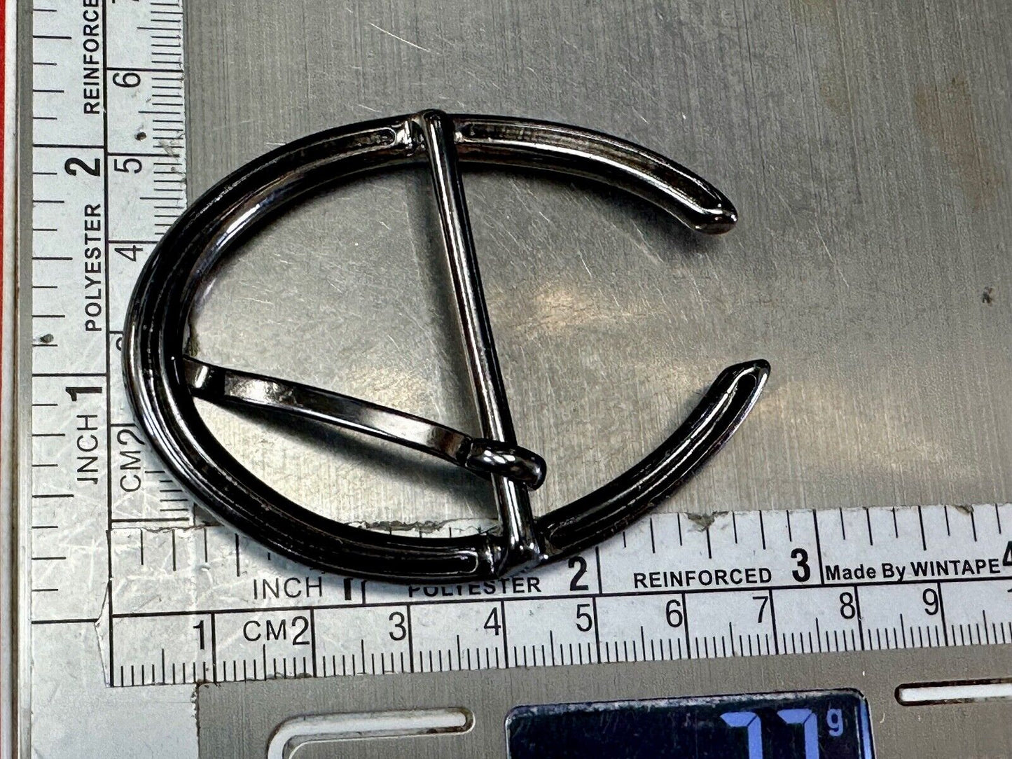 unique open oval black colored dress style belt buckle