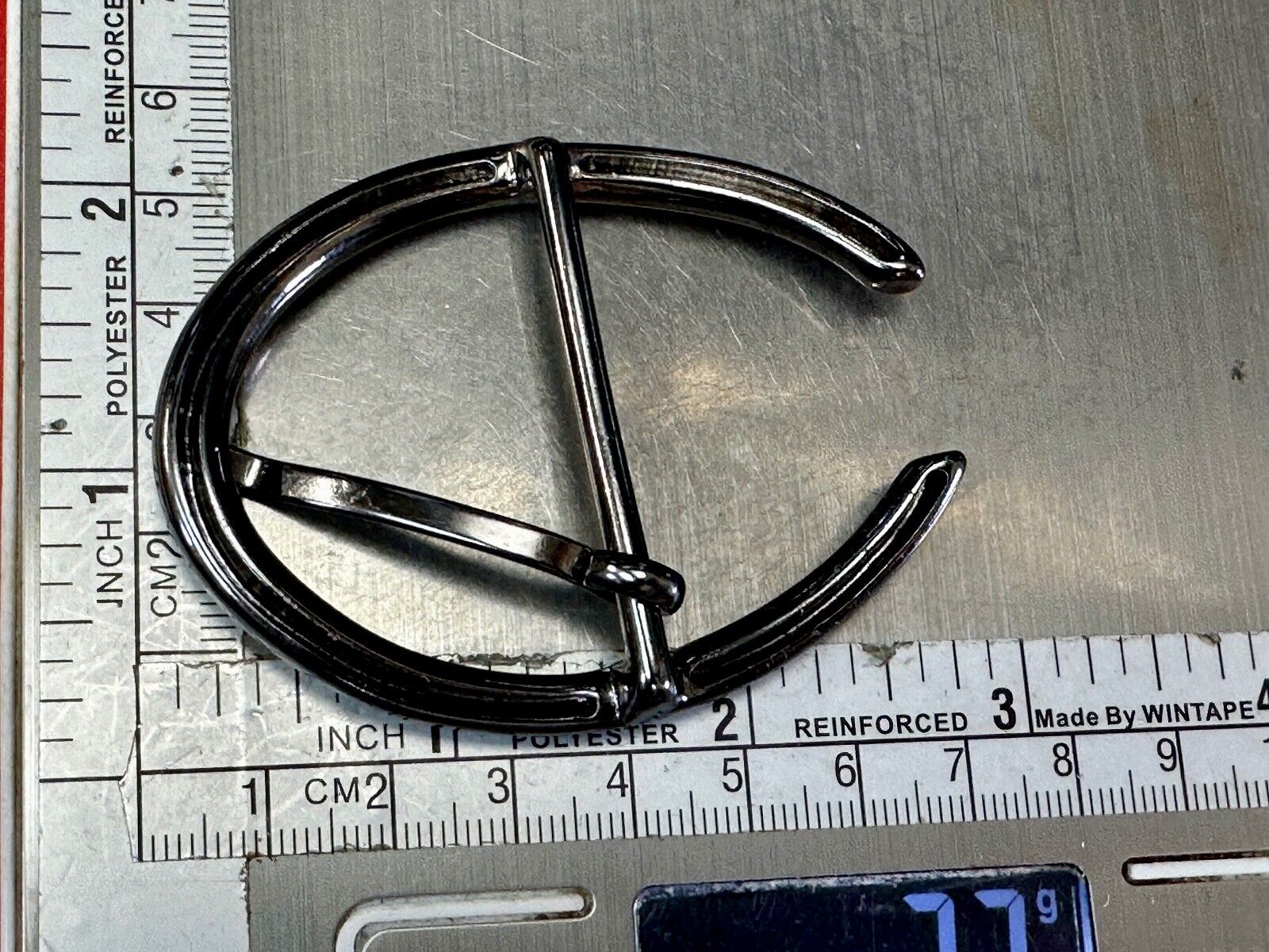 unique open oval black colored dress style belt buckle