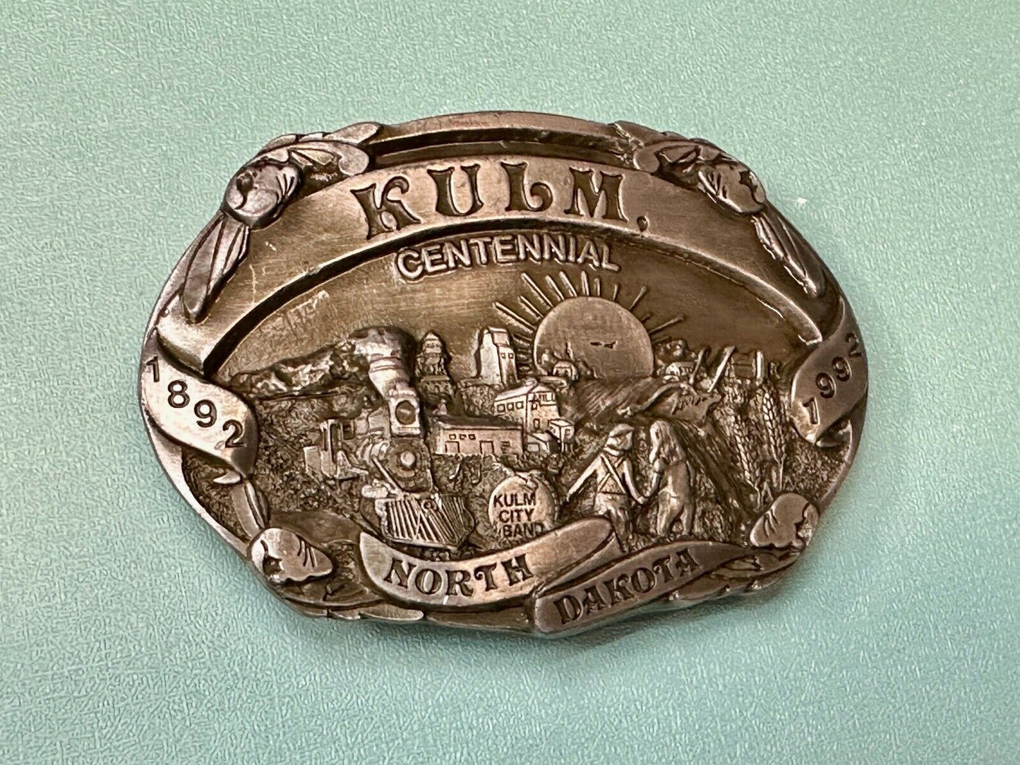 Vintage KULM North Dakota commemorative belt buckle by DART inc.
