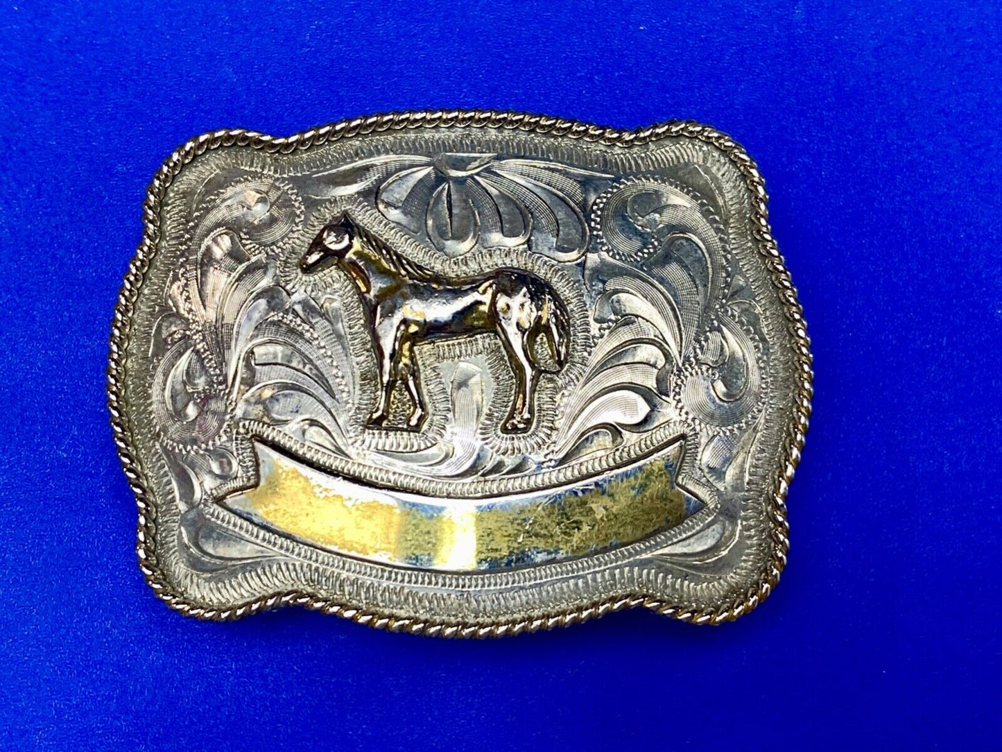 Vintage HORSE western Justin Boot Company belt buckle with Award Ribbon