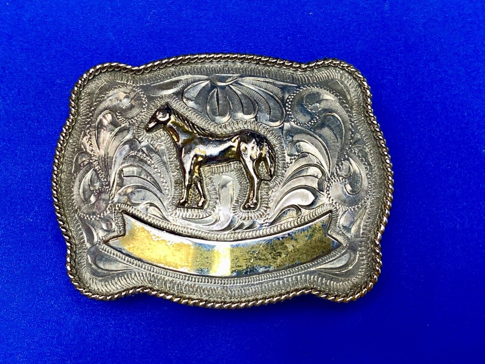 Vintage HORSE western Justin Boot Company belt buckle with Award Ribbon