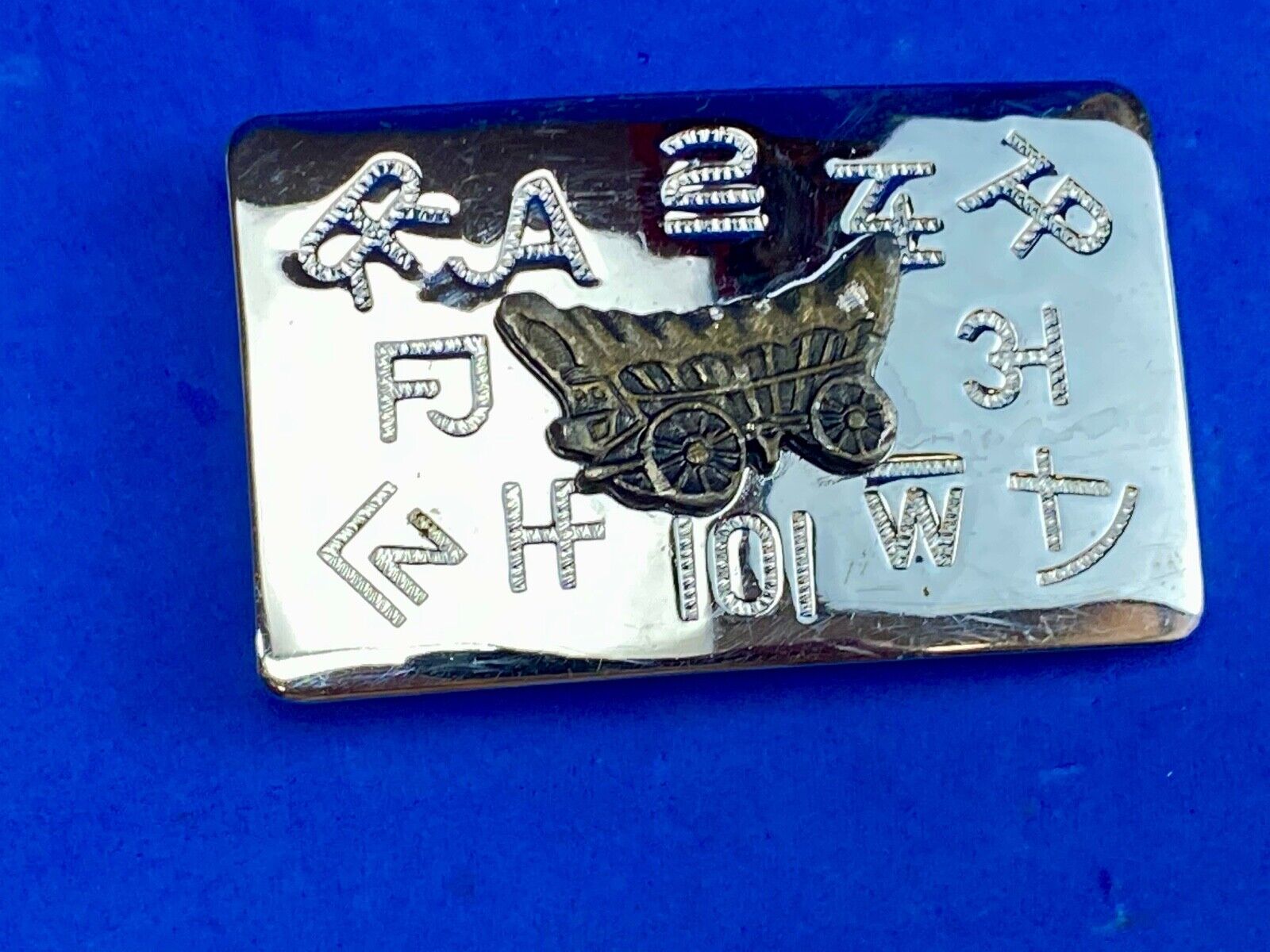 Vintage Chaimbers covered wagon western belt buckle with branding signs marks 
