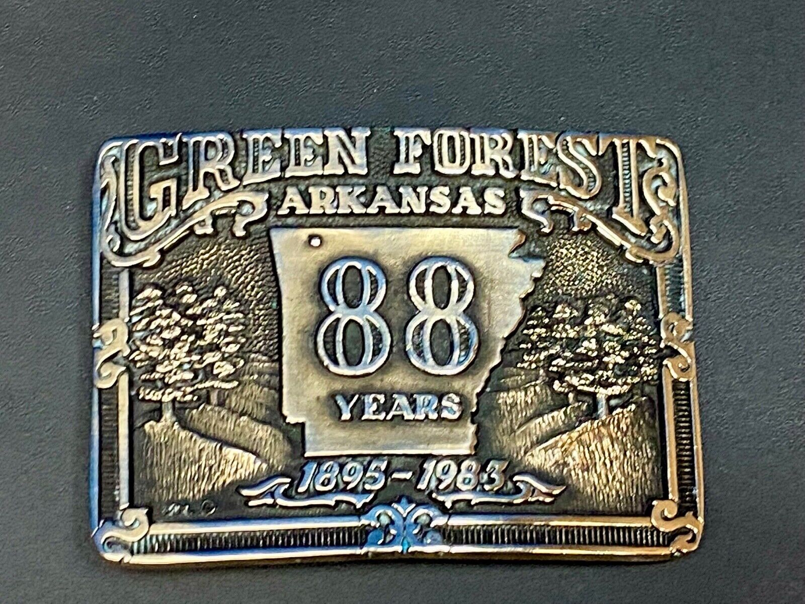 Arkansas green forest 88 year celebration belt buckle limited to 500!  by ADM