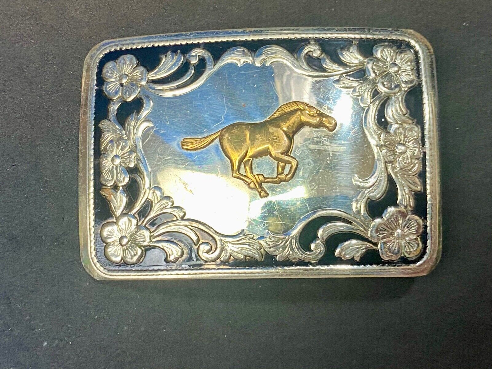 Antique Horse western Nickle Silver and black paint flower swirl belt buckle 
