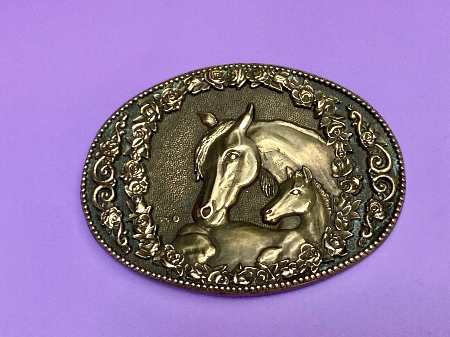 Two horse heads First addition brass belt buckle by Award Design Medals
