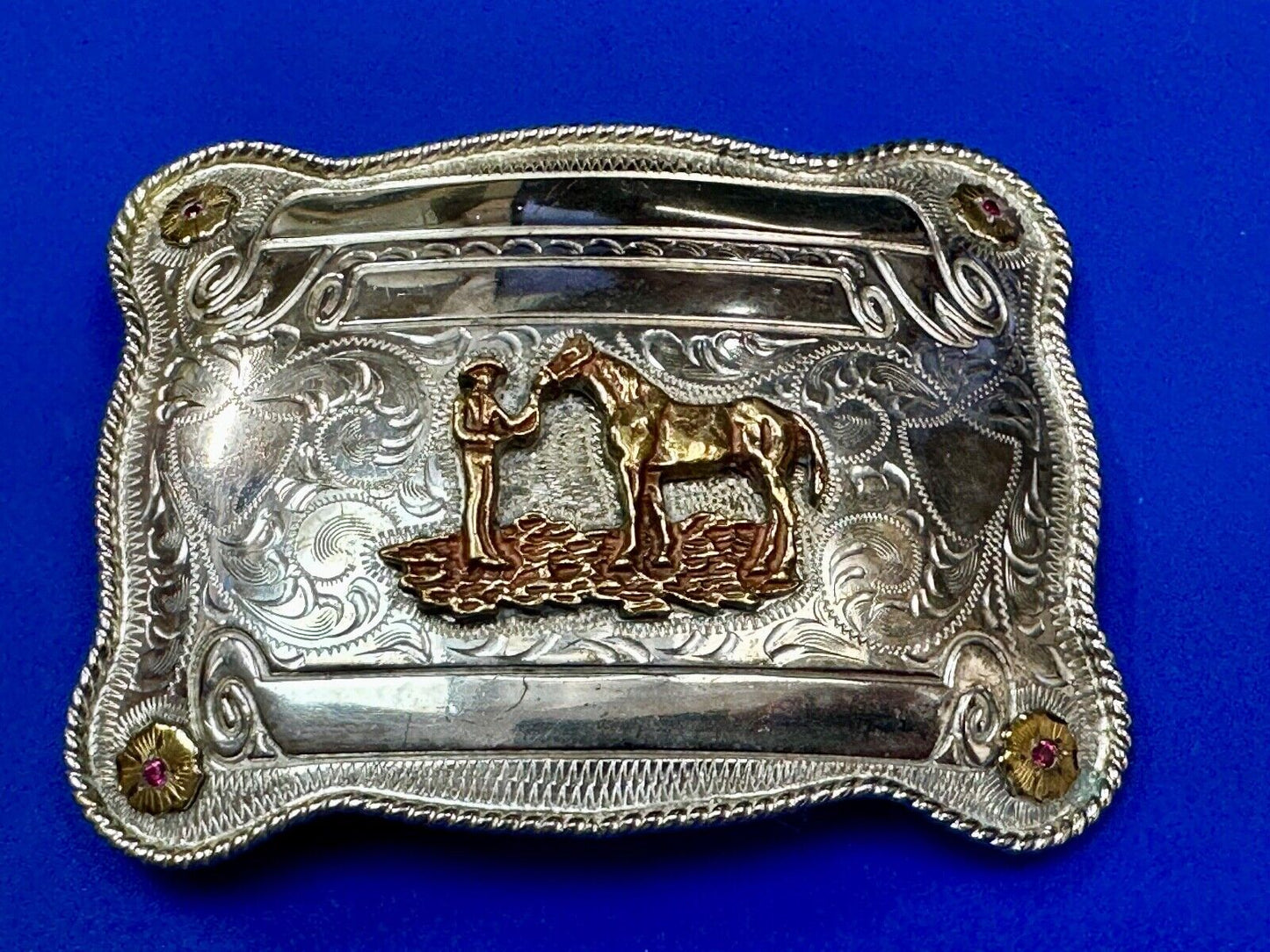 A man with his horse two tone, red ruby Belt Buckle - blank award scrolls