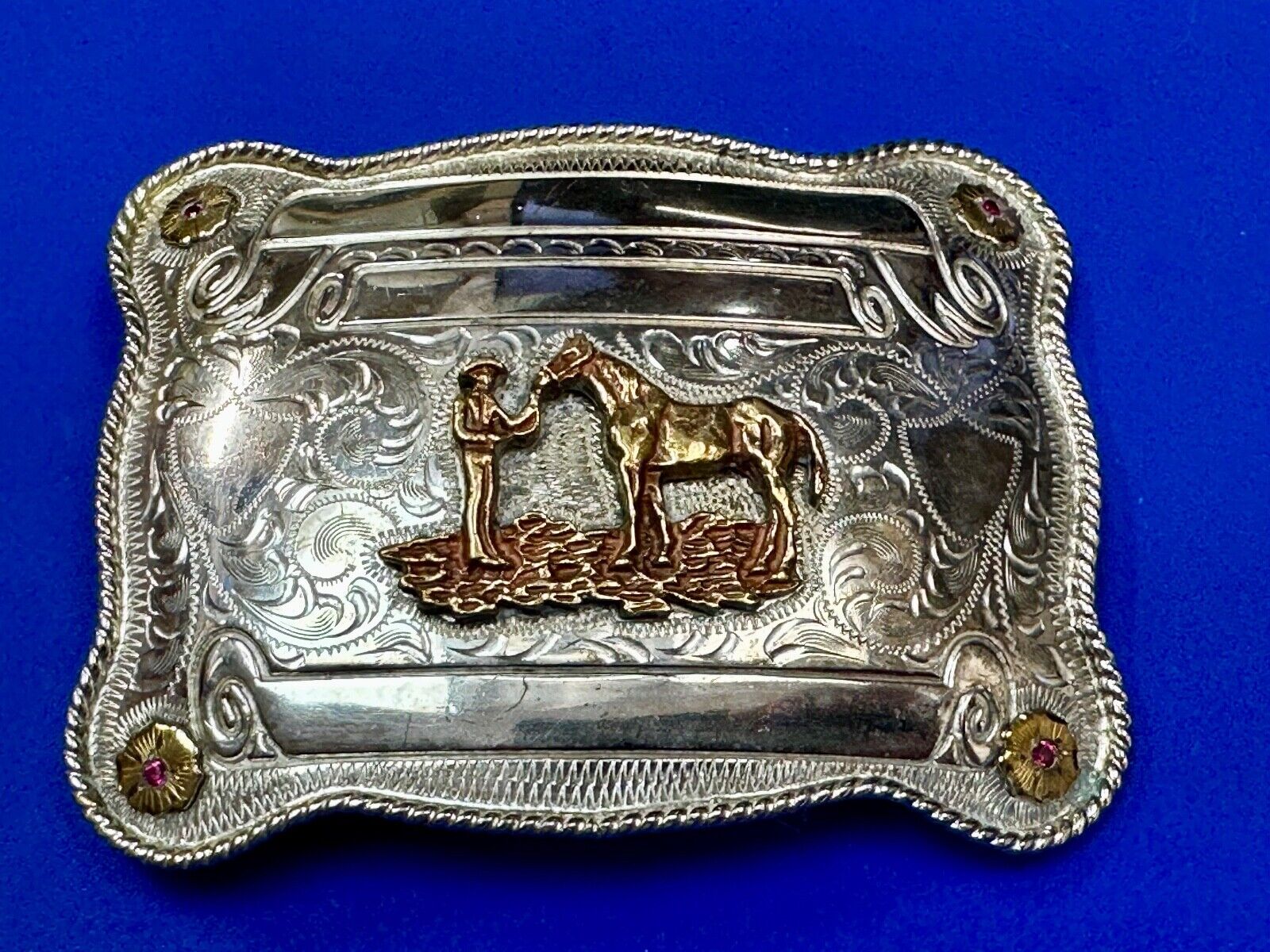 A man with his horse two tone, red ruby Belt Buckle - blank award scrolls