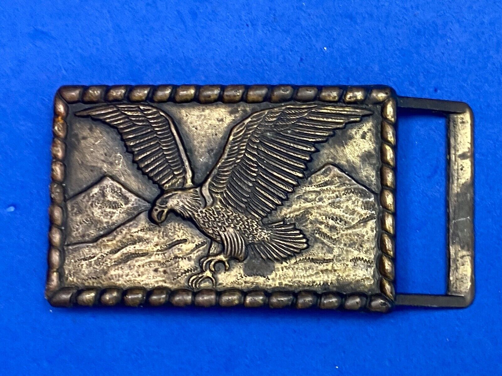 Hunting, Diving Flying Patriotic Eagle Over Mountain Range Belt Buckle 