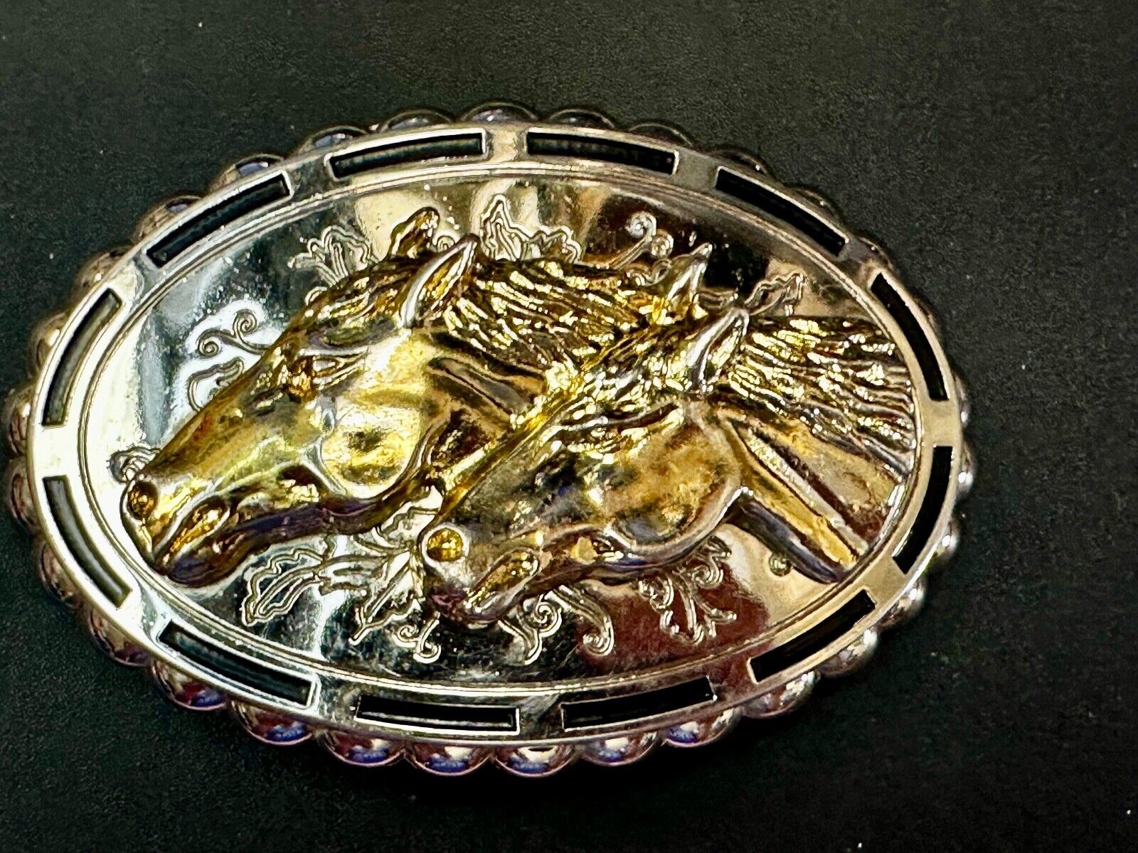 Two horse heads - Vintage two tone oval Belt Buckle with reflective backing