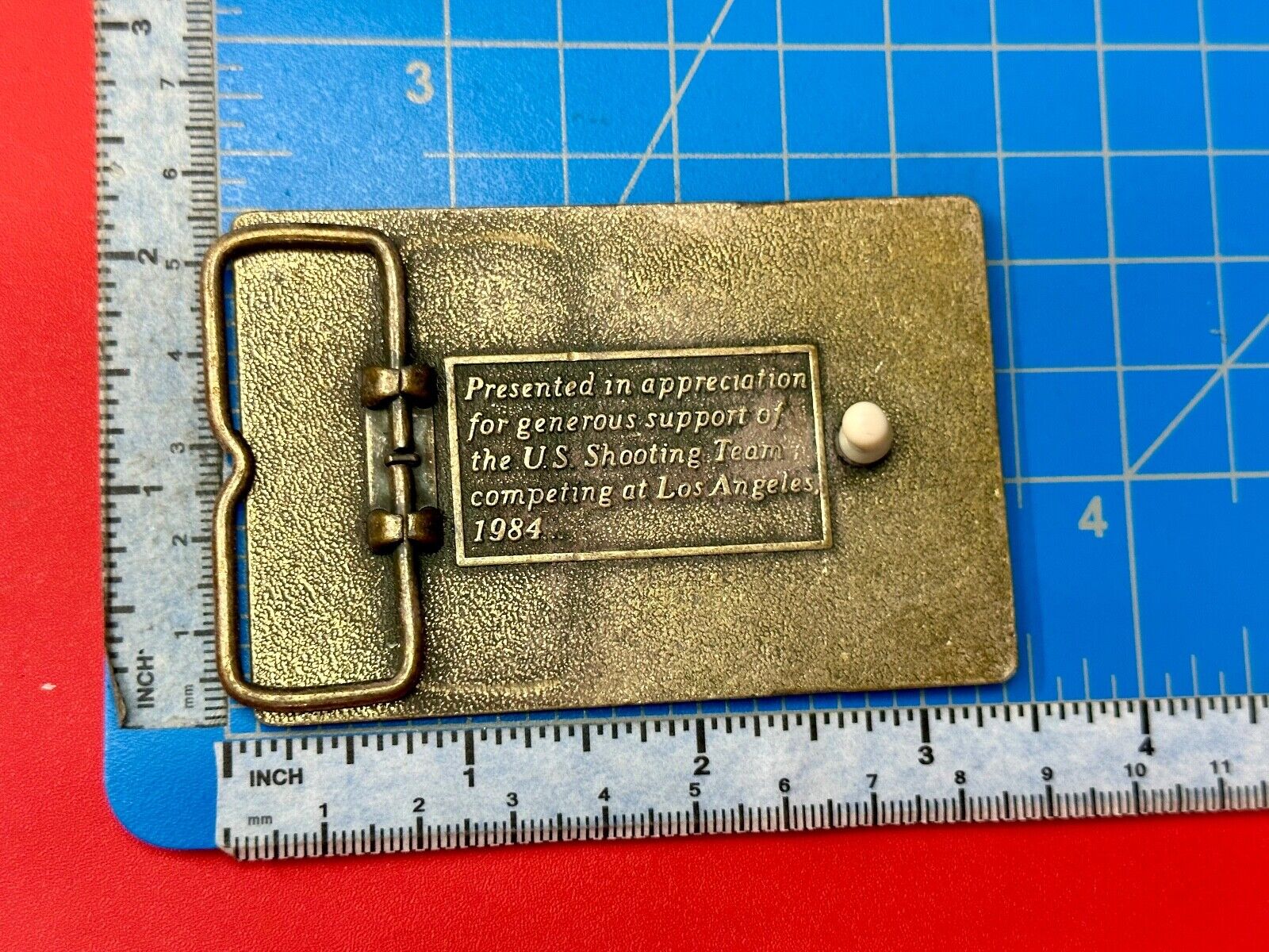 Aiming for Olympic gold - Los Angeles 1984 US shooting Team belt buckle