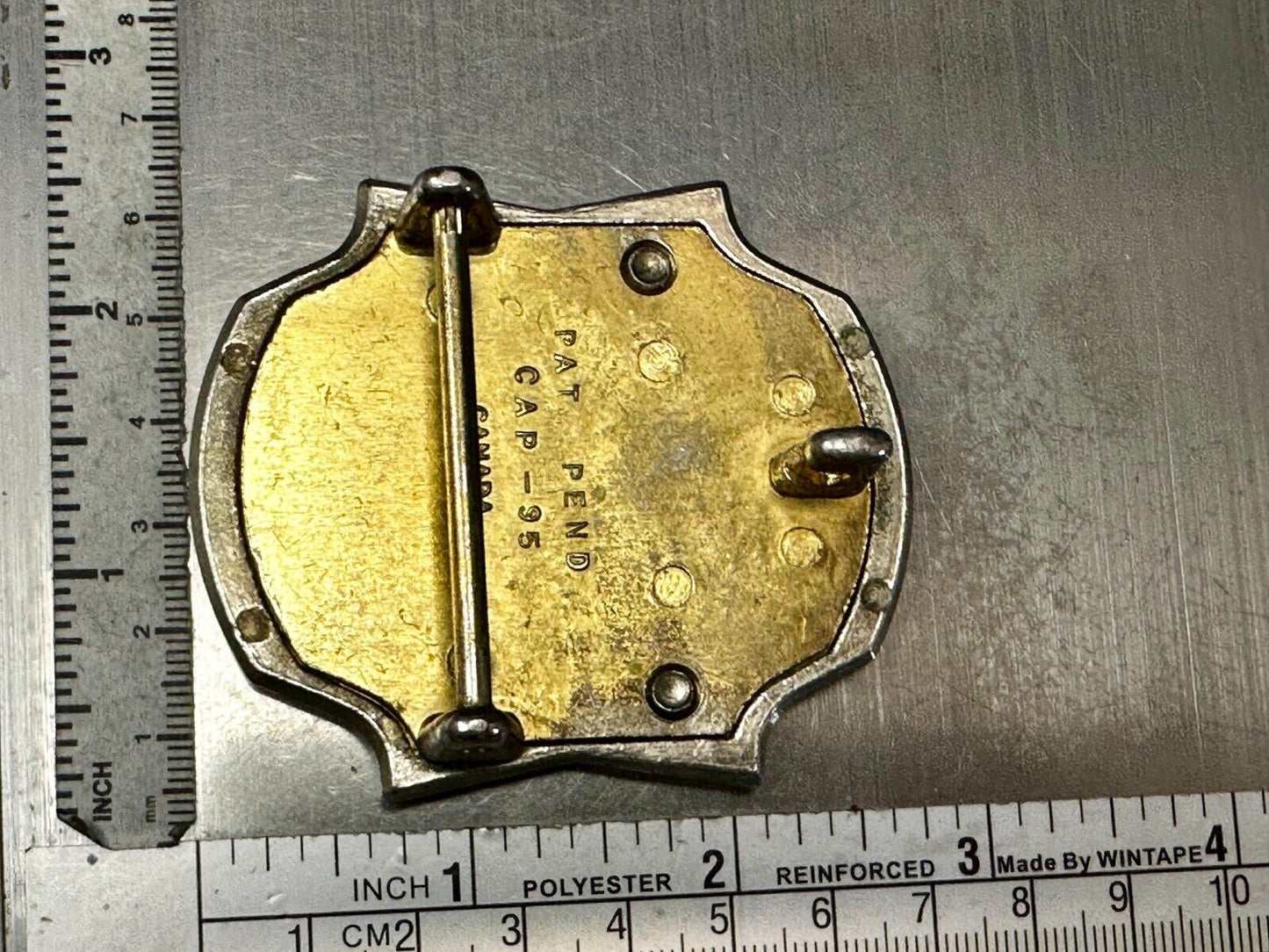 Unknown to me!  Vintage Metal Belt Buckle Pat.Pend Cap-95 Canada
