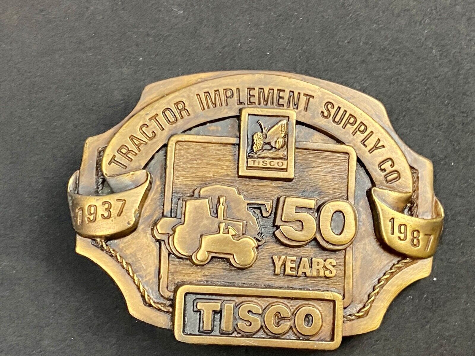 Vintage 1986 Tisco Tractor 50 years Anniversary Belt Buckle by Siskiyou 