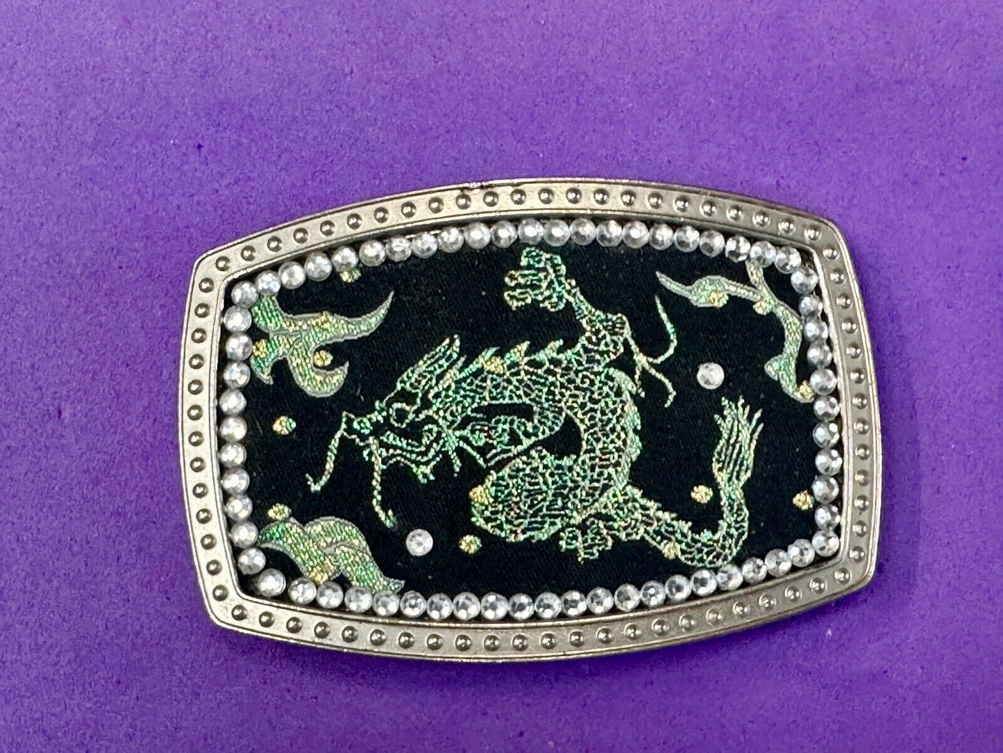 Chinese Dragon pattern symbol on silver tone rhinestone accented belt buckle