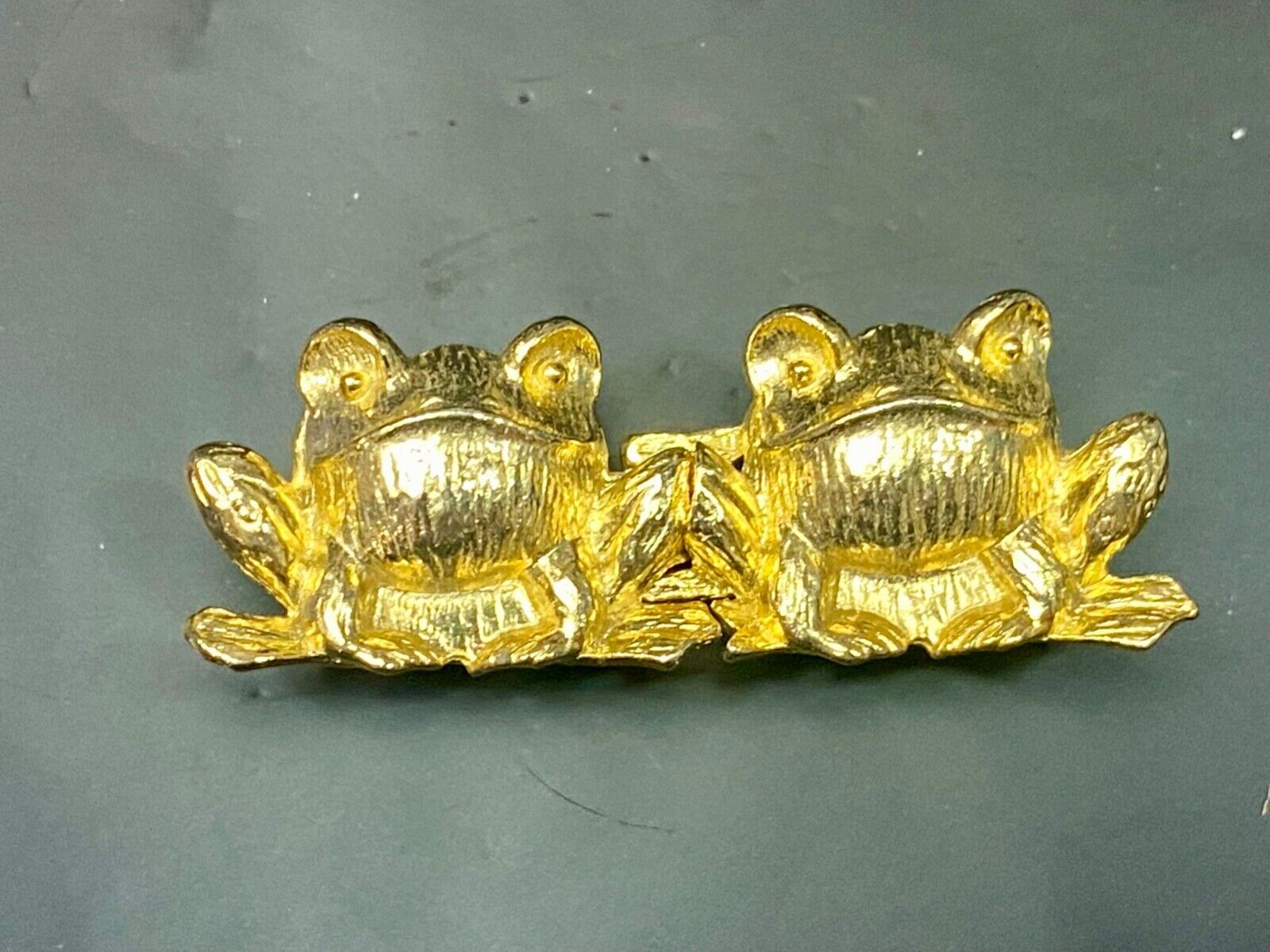 Adorable Leaping Frogs gold color interlocking belt buckle by JEANNIE BOUCHEVER
