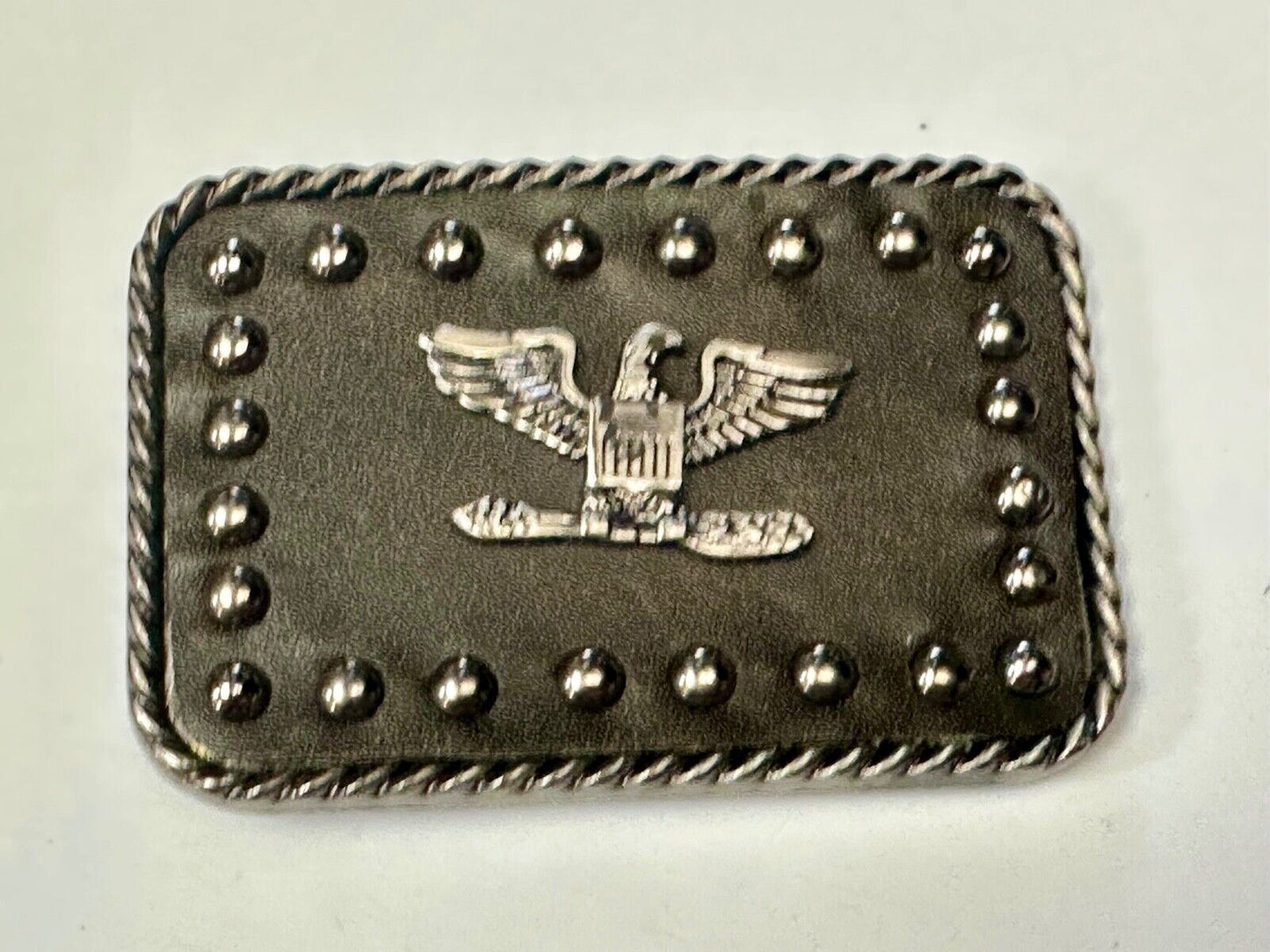 American Eagle - biker style studded black leather background belt buckle