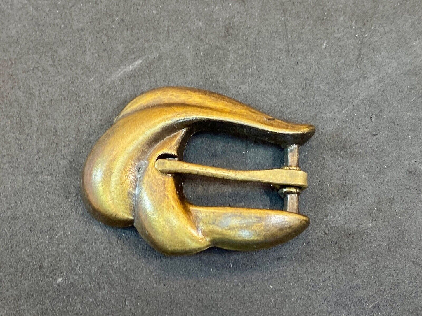 apple acc of New York stamped gold tone retro belt buckle