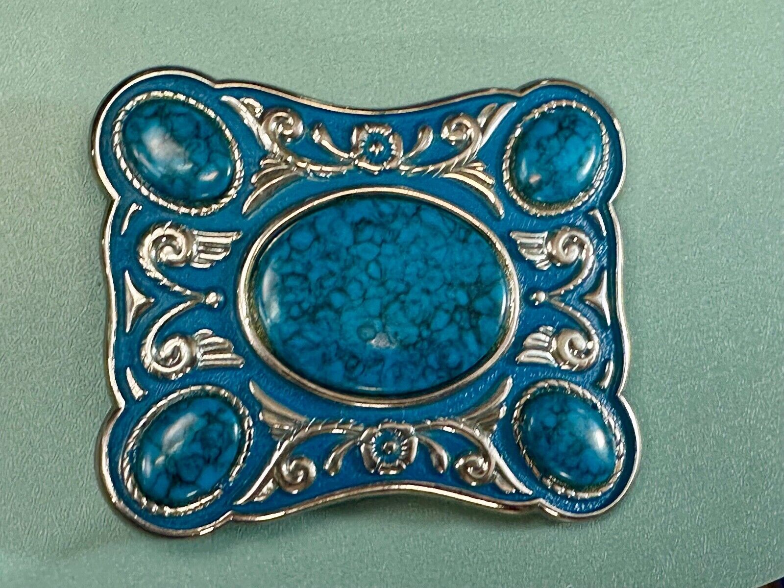 Turquoise Colored Cabochon Stones on Silver Tone Southwestern belt buckle