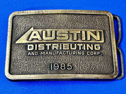 Austin Texas Distributing and Manufacturing 1985 Advertisement Promo Belt Buckle