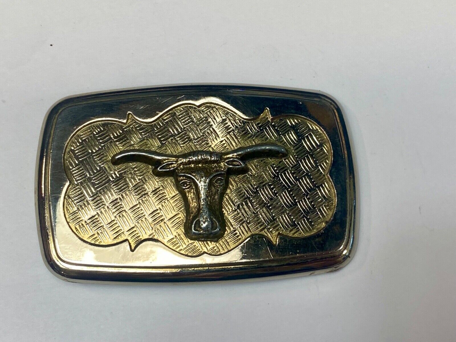 Vintage gold tone Texas Longhorn Steer mesh background western belt buckle
