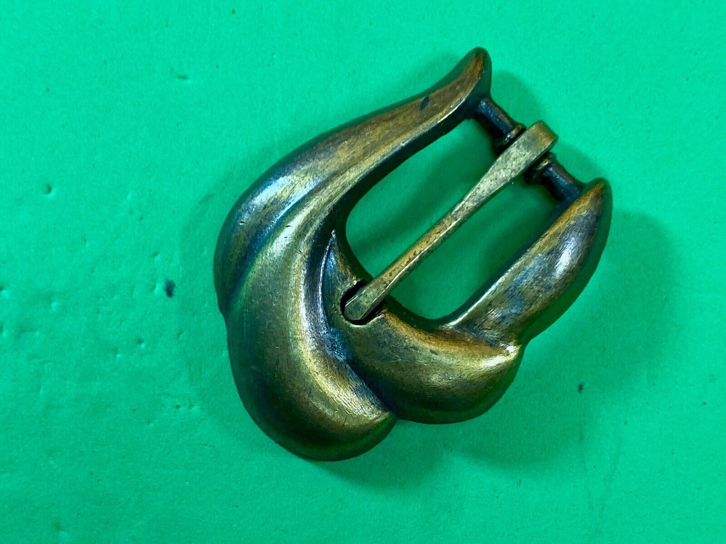 apple acc of New York stamped gold tone retro belt buckle