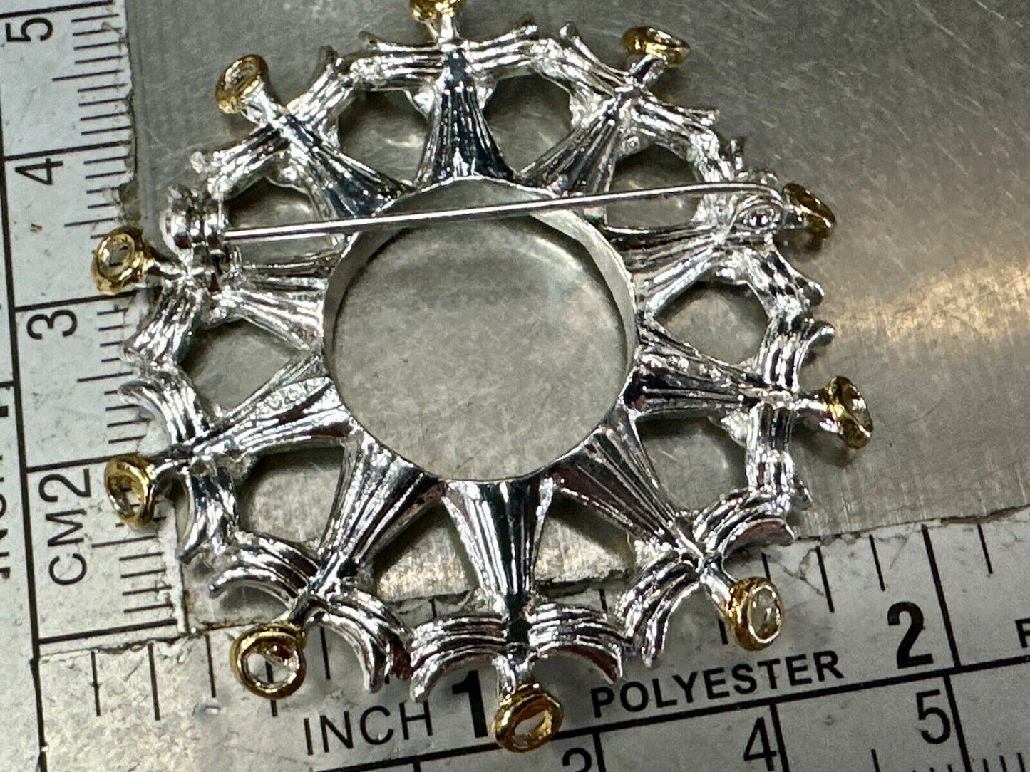 Angles in Circular pattern holiday wreath Avon signed vintage brooch pin