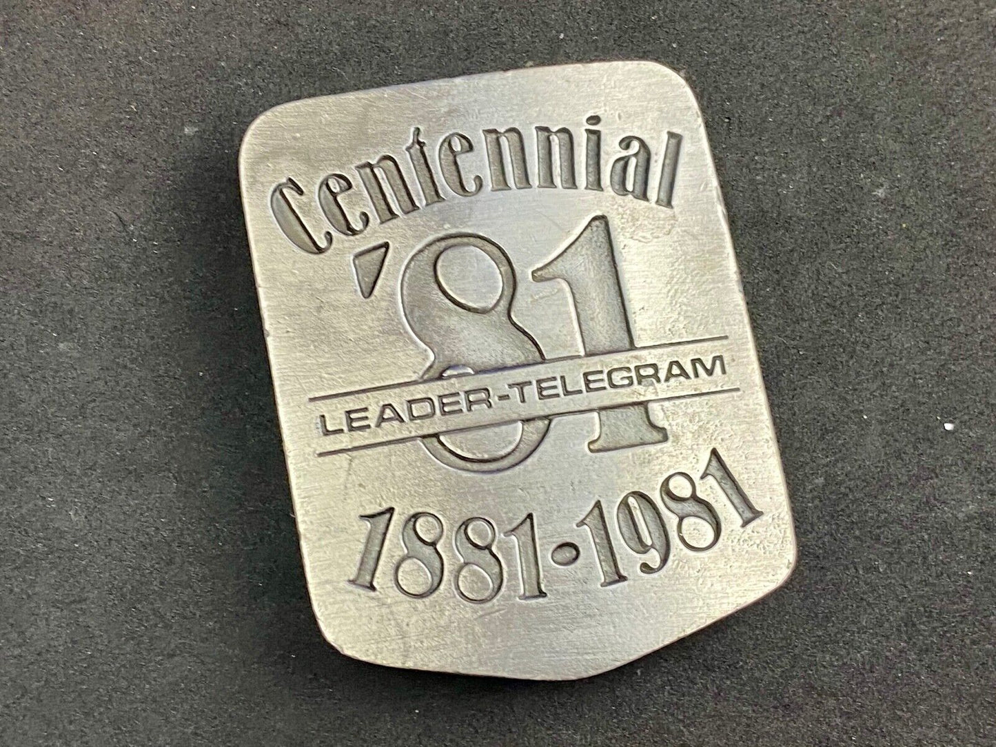 Vintage 1981 LEADER TELEGRAM BELT BUCKLE NEWSPAPER EAU CLAIRE & WEST CENTRAL WI