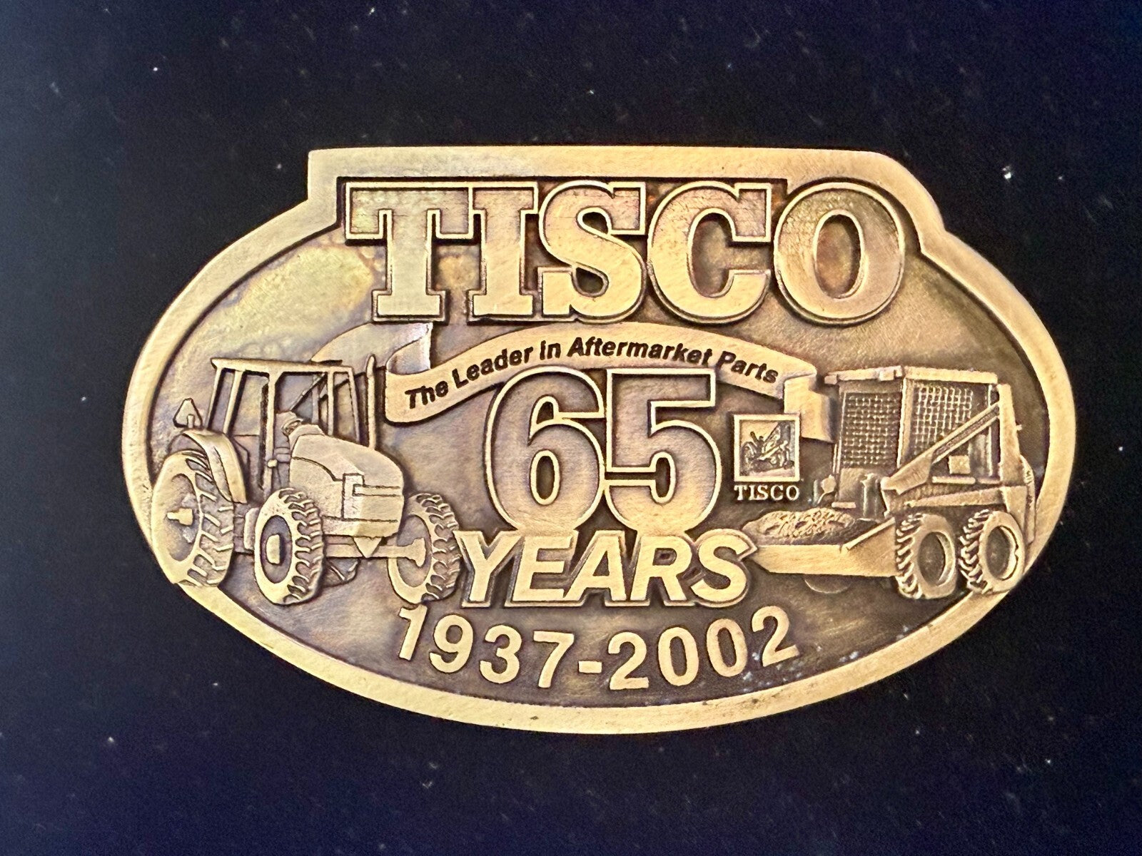 TISCO The Leader in Aftermarket Parts 65 Years 1937-2002 SPEC-CAST Belt Buckle