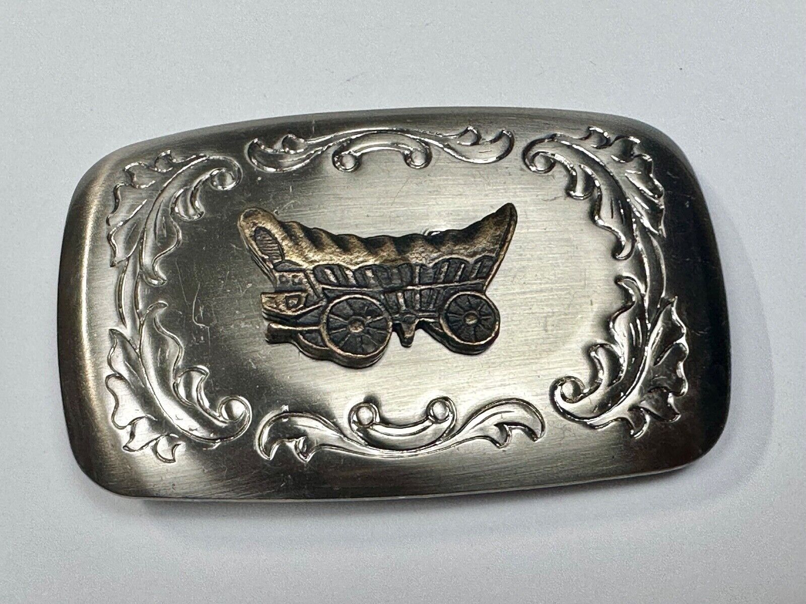 Vintage covered wagon two tone western mixed metal belt buckle