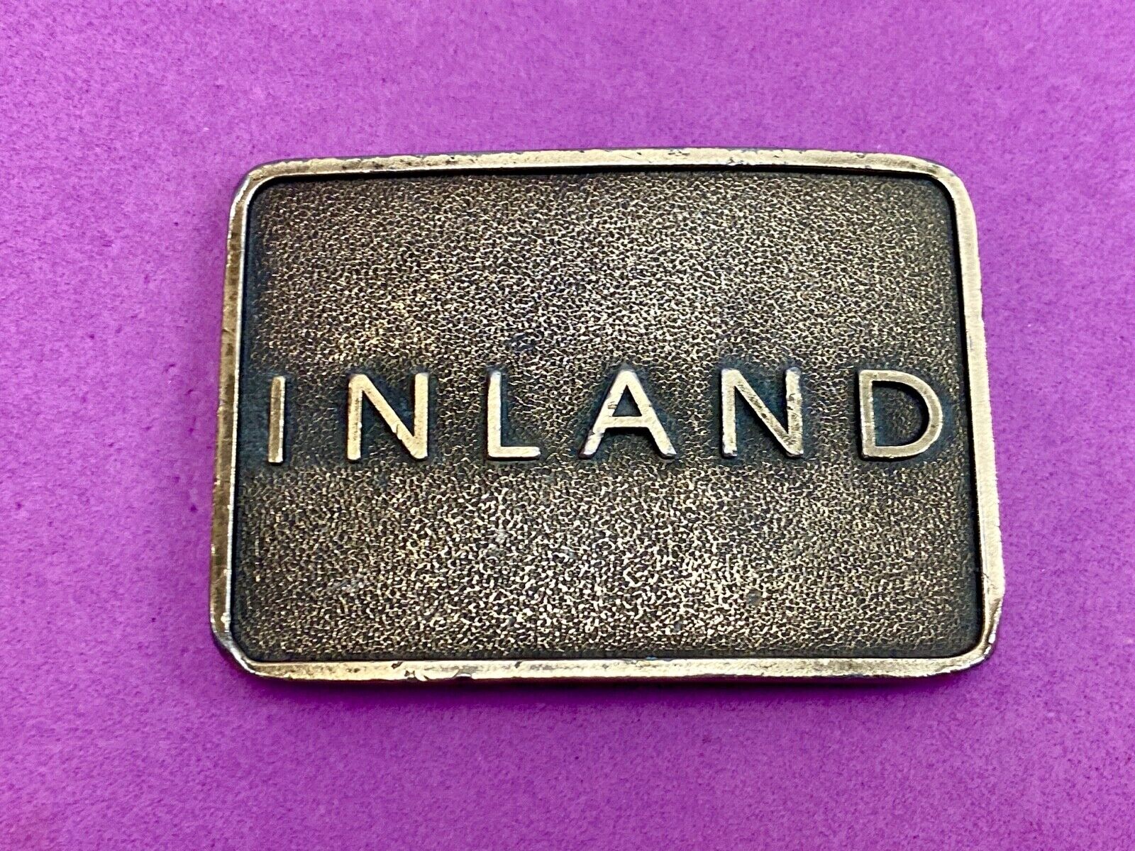 Vintage Inland company belt buckle - truck parts company 