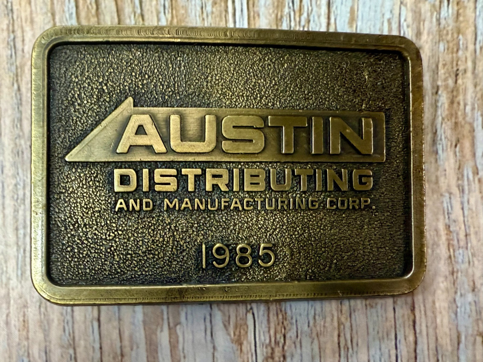 Austin Texas Distributing and Manufacturing Corp 1985 NOS RJ Belt Buckle