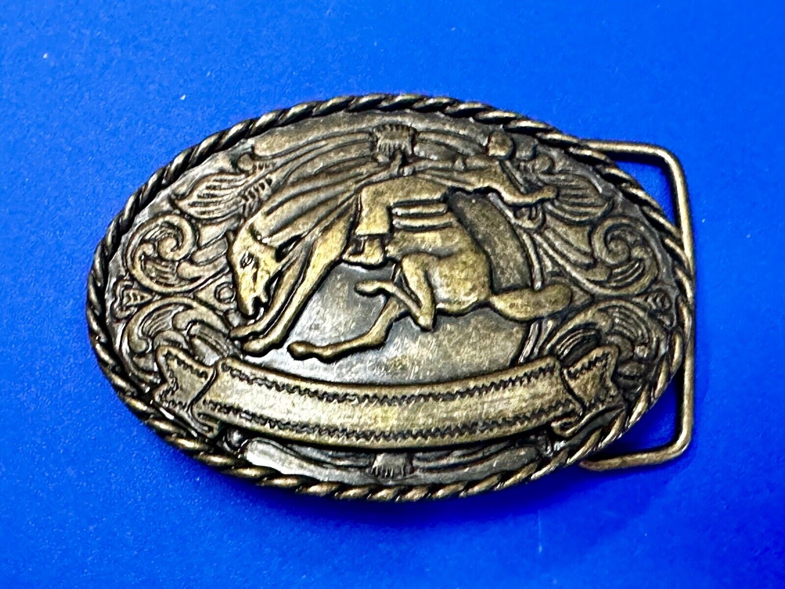 Abstract Vintage Cowboy Saddle Bronc western belt buckle with award ribbon