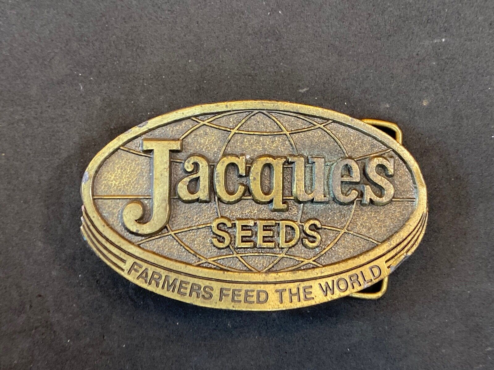 Vintage 1977 Jacques Seeds belt buckle  -  Farmers feed the world by lewis 