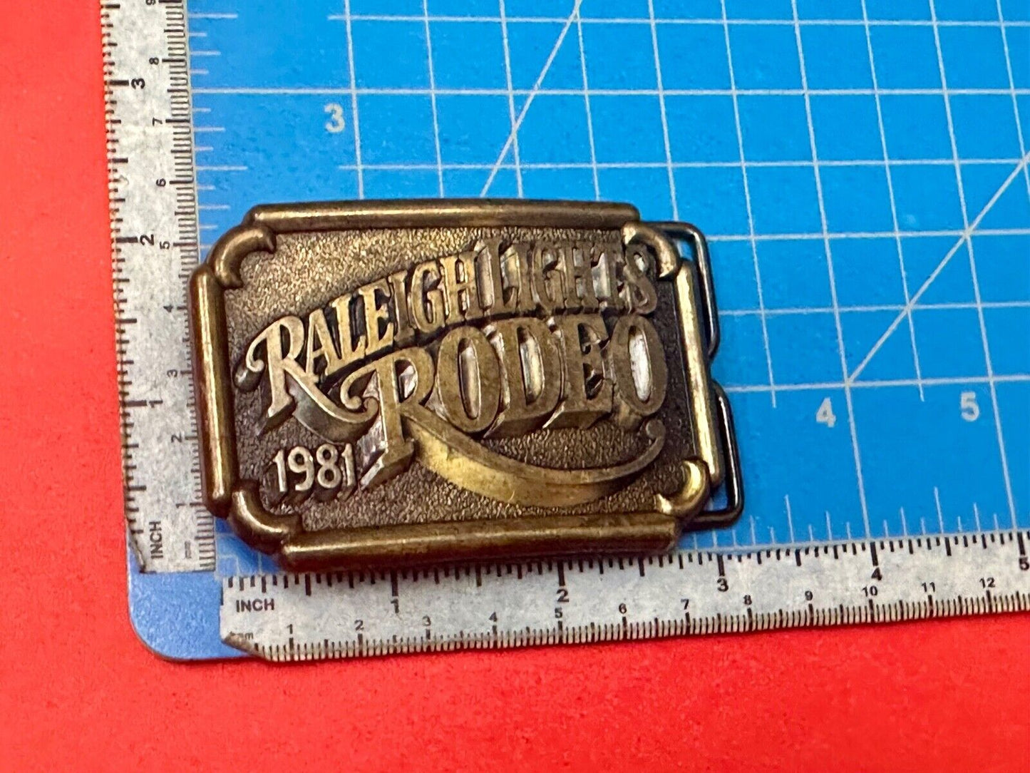 Vintage 1981 Raleigh Lights Rodeo Brass Tone Belt Buckle Advertising Cigarettes