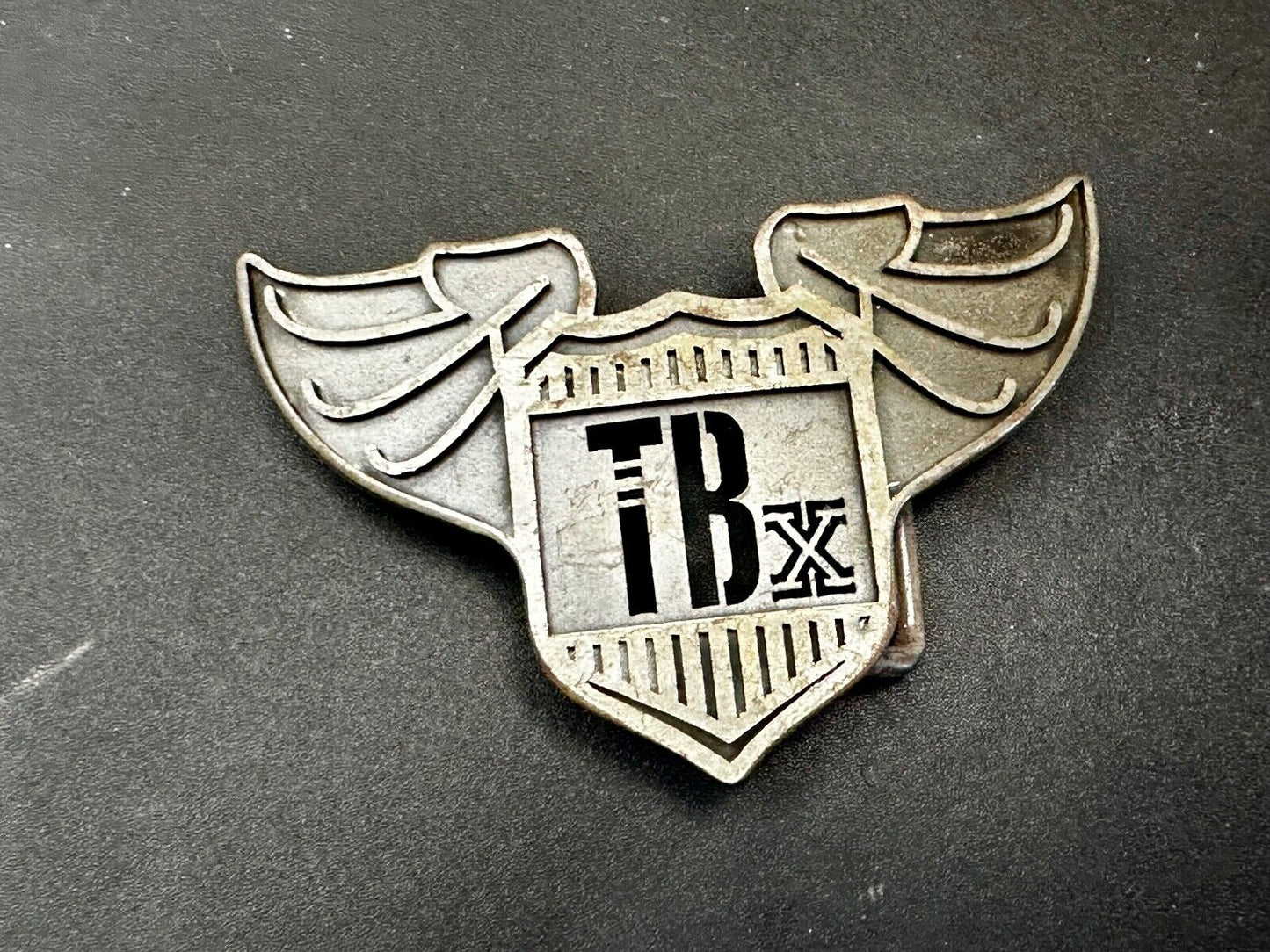 TBX Winged Bomb Vintage Silver Tone Cutout Belt Buckle