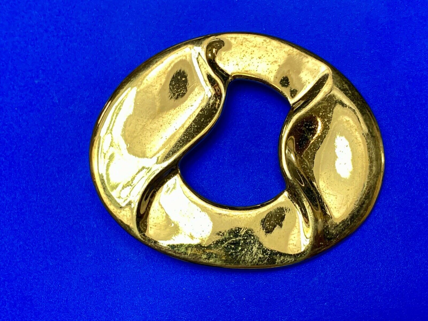 Artist Ginnie Johansen signed gold color abstract oval scarf slide