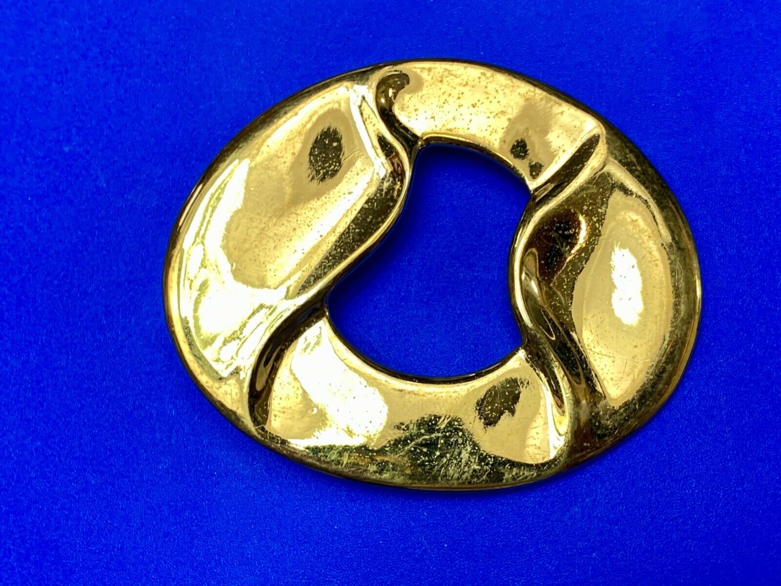 Artist Ginnie Johansen signed gold color abstract oval scarf slide