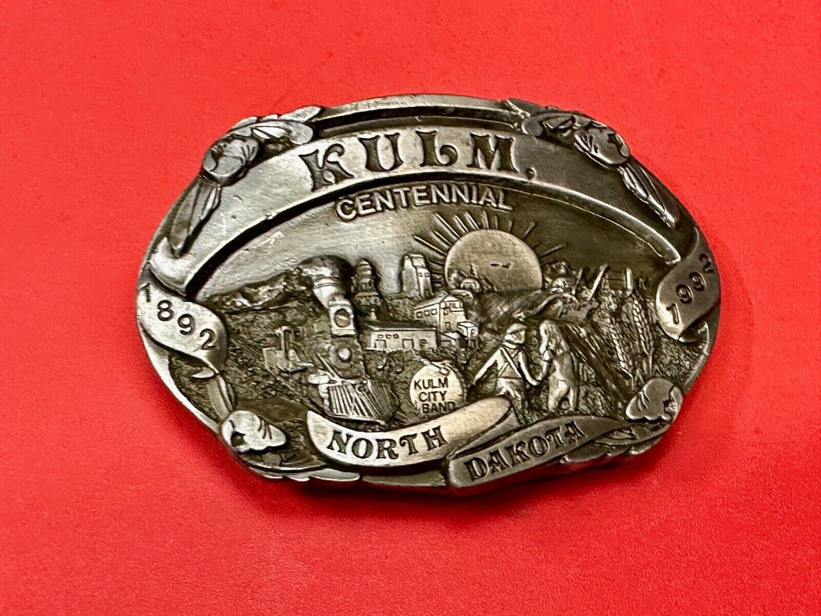 Vintage KULM North Dakota commemorative belt buckle by DART inc.