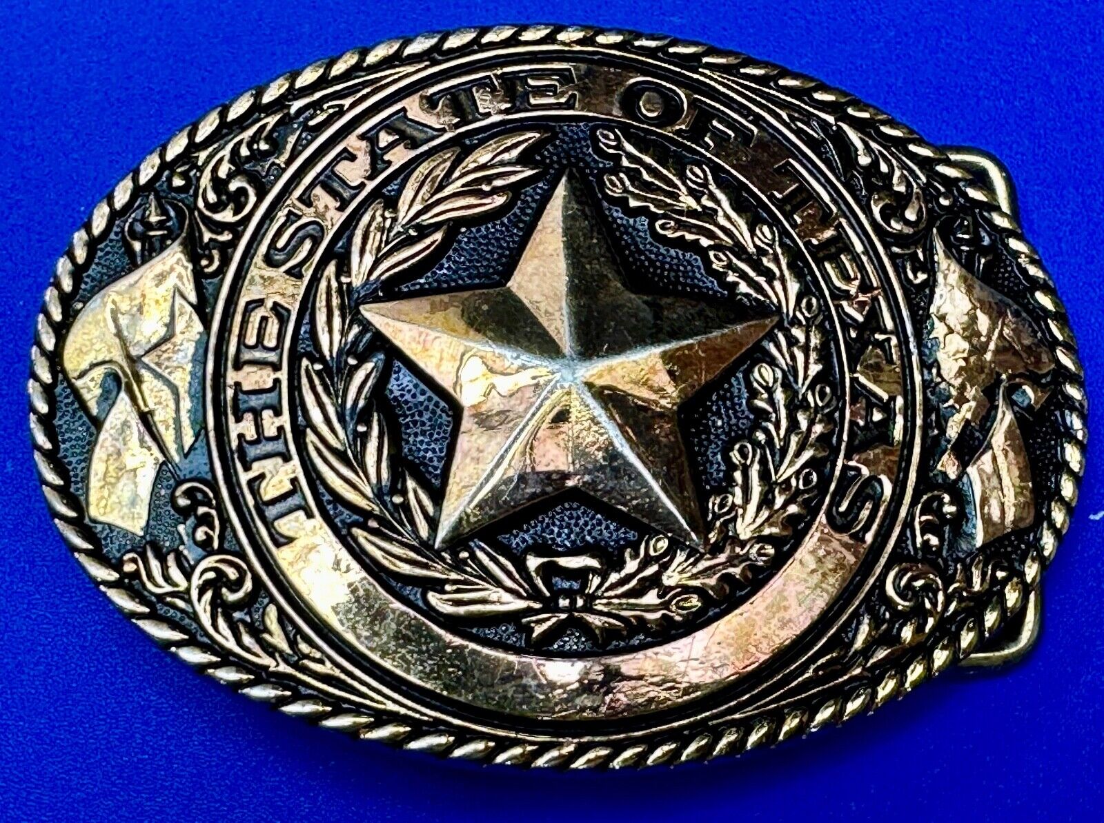 TEXAS State Pride - RAISED 3D STAR centered in brass tone oval Belt Buckle