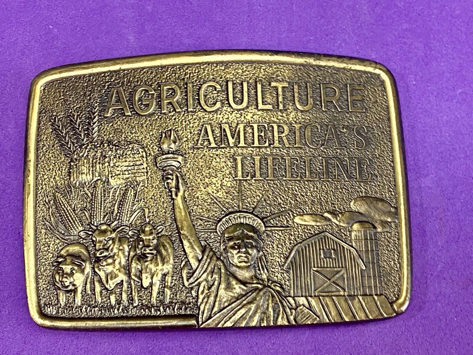 AGRICULTURE, Americas Lifeline belt buckle by Farmhand - Statue of liberty 