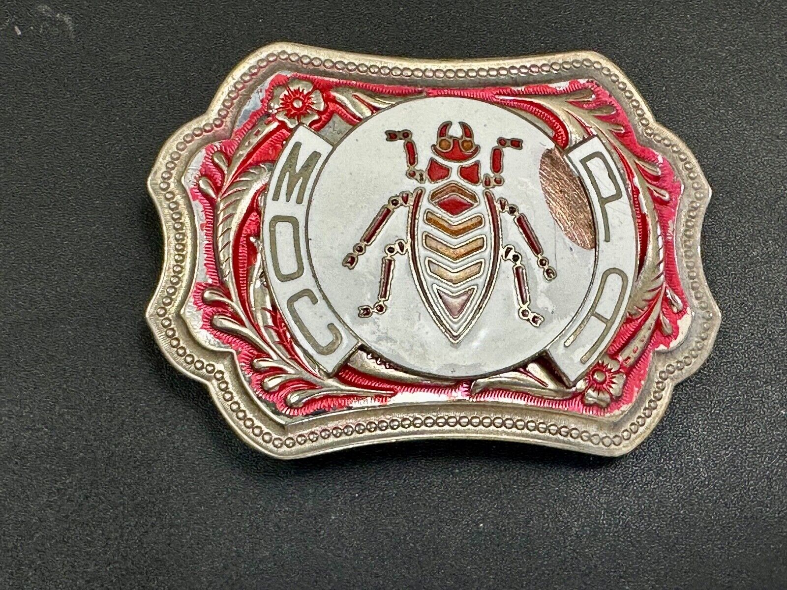 unique insect bug centerpiece on western red & white flower swirl belt buckle