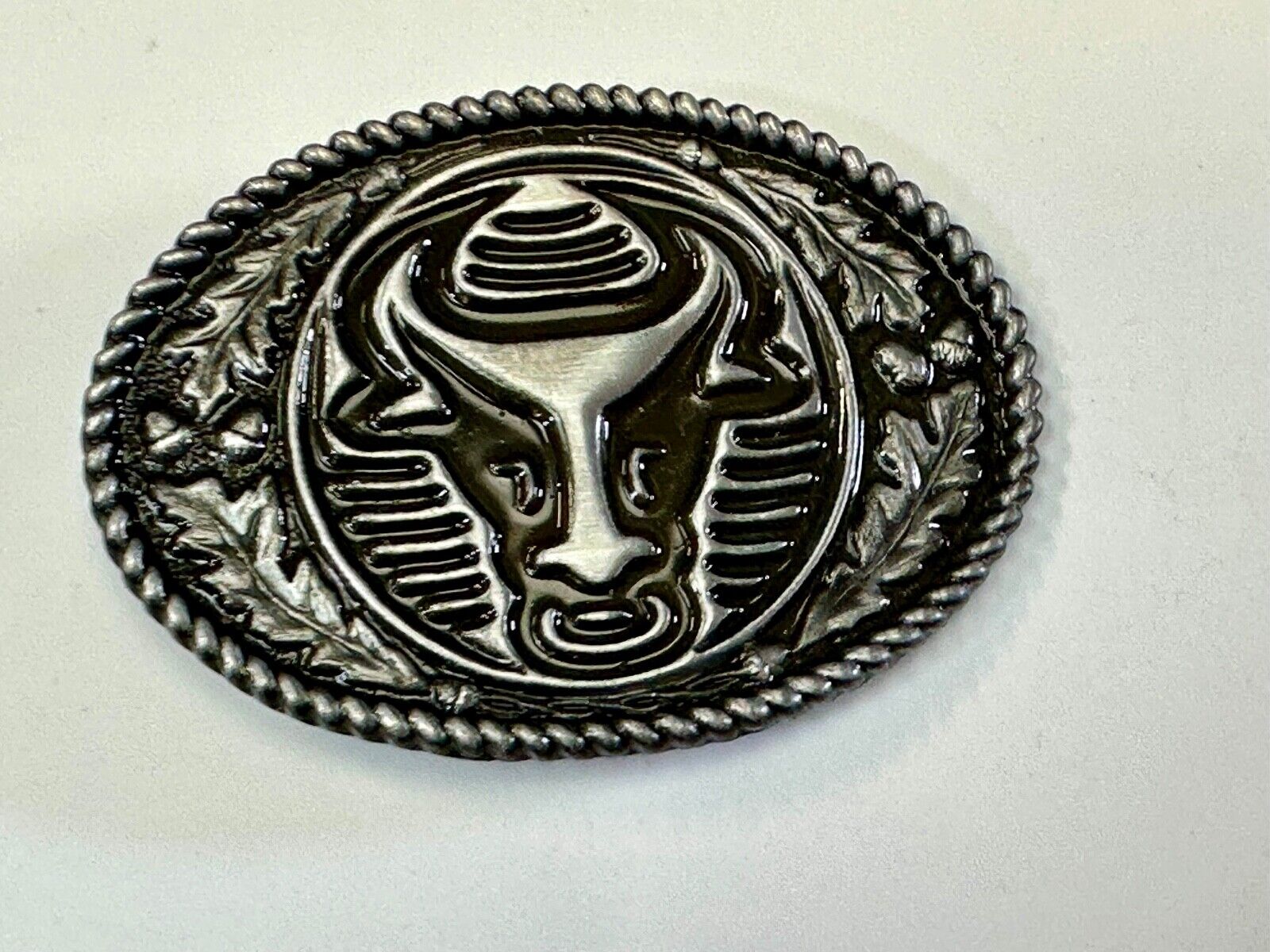 The Longhorn cow steer with nose ring Vintage rope boarder belt buckle
